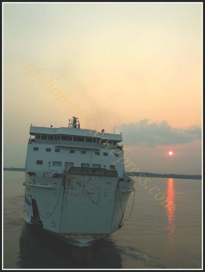 Sunset ferry on the South China Sea